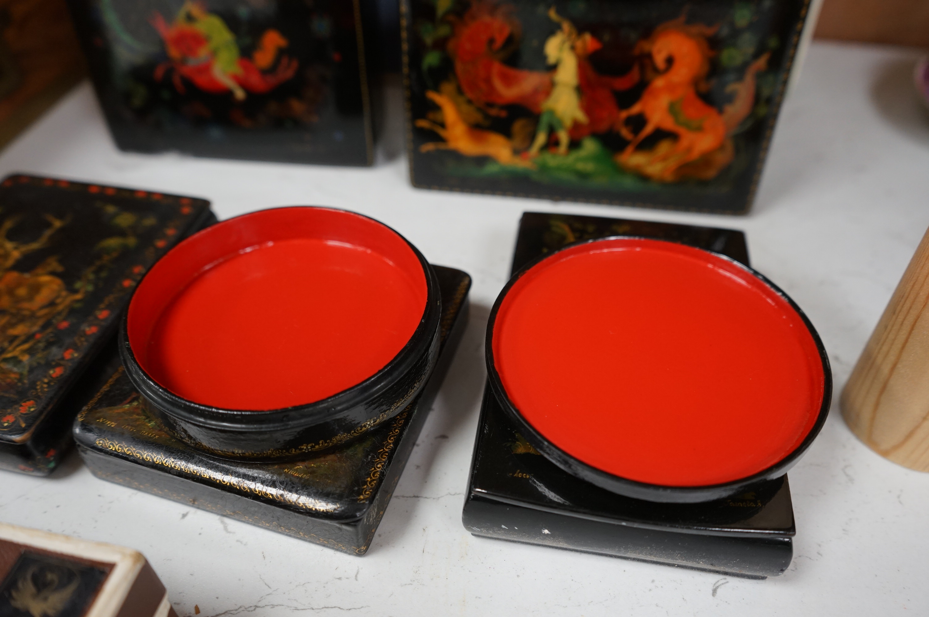 Six late 19th / early 20th century Russian lacquer boxes to include a circular example, largest 15cm wide. Condition - good